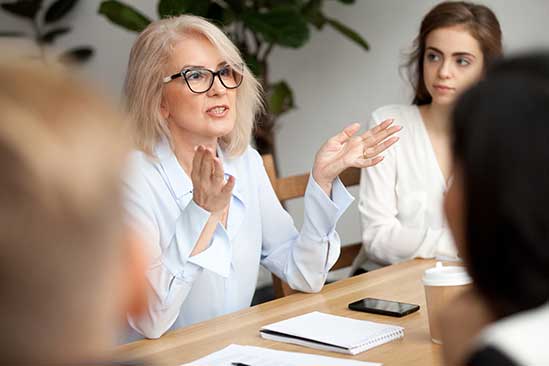 People around Table - Mastermind Group